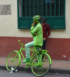 Green man on bicycle